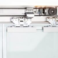 Automatic sliding door opener with sensor