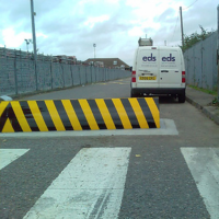Rising kerbs road blocker installation